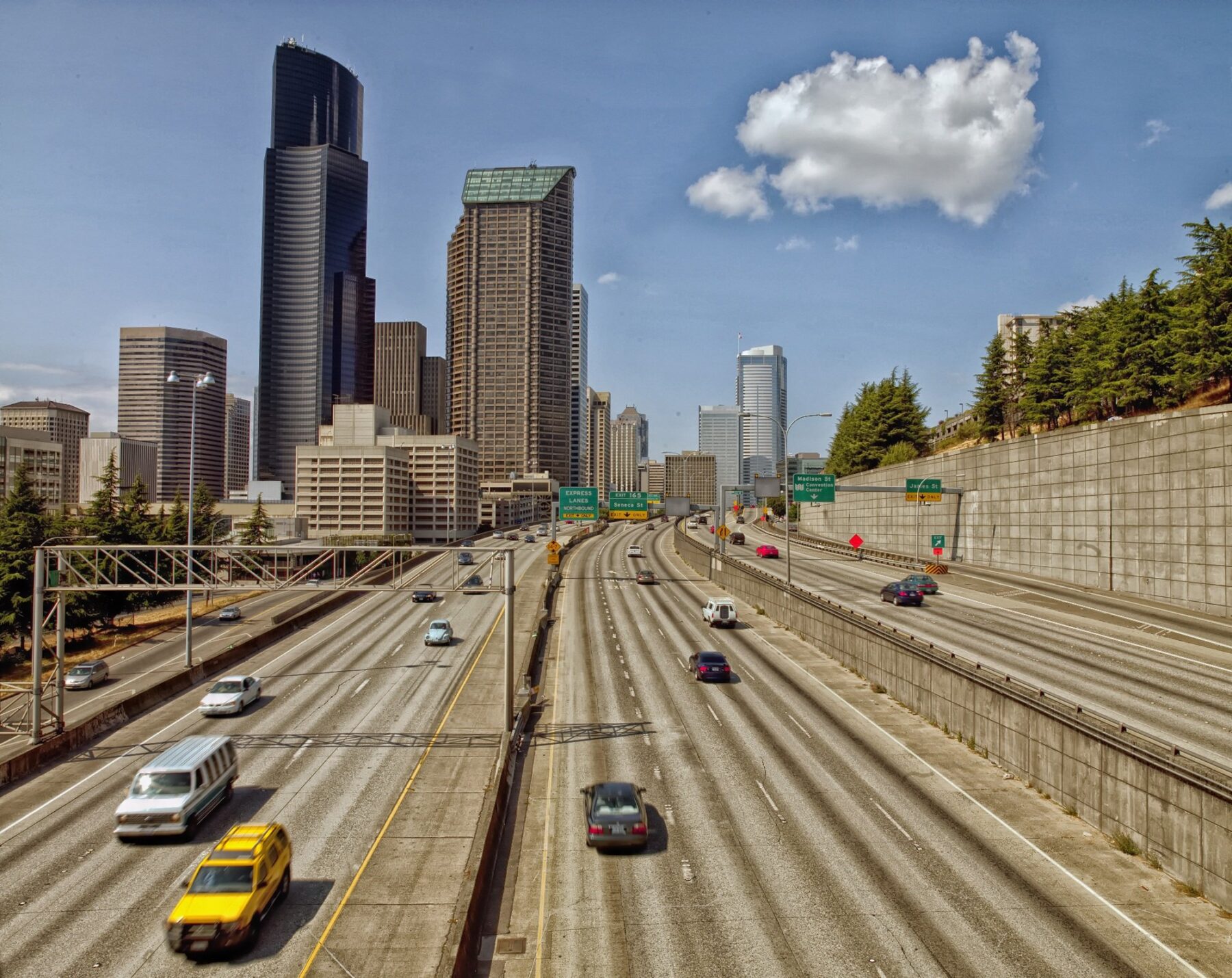 Acoustic metamaterial concrete could help lower noise pollution, like noisy city roads and interstates like this one, with skyscrapers in the background.